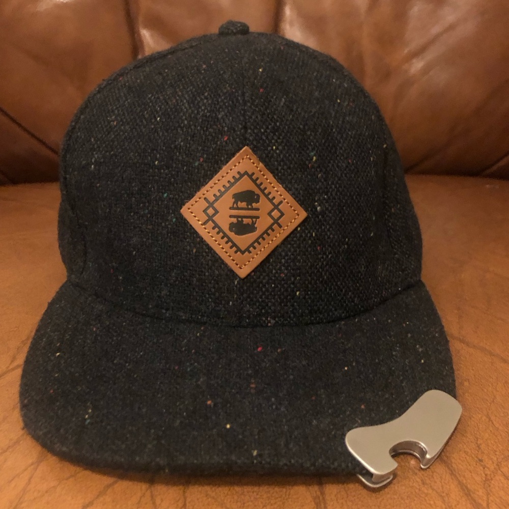 Baseball cap with bottle opener